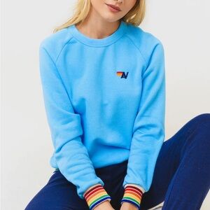 Blue Aviator Nation Crewneck Sweater with Rainbow Cuffs & Hem
